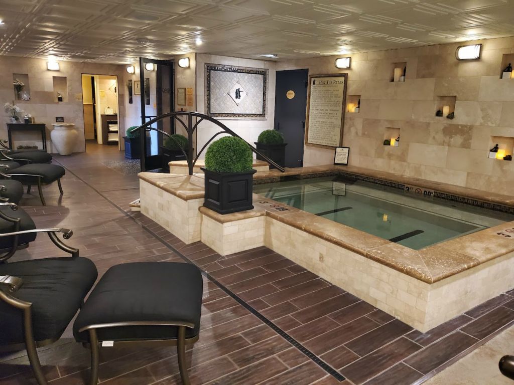 The hot tub and lounge chairs